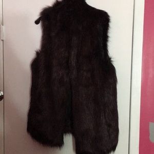 Dark purple fur vest. Faux